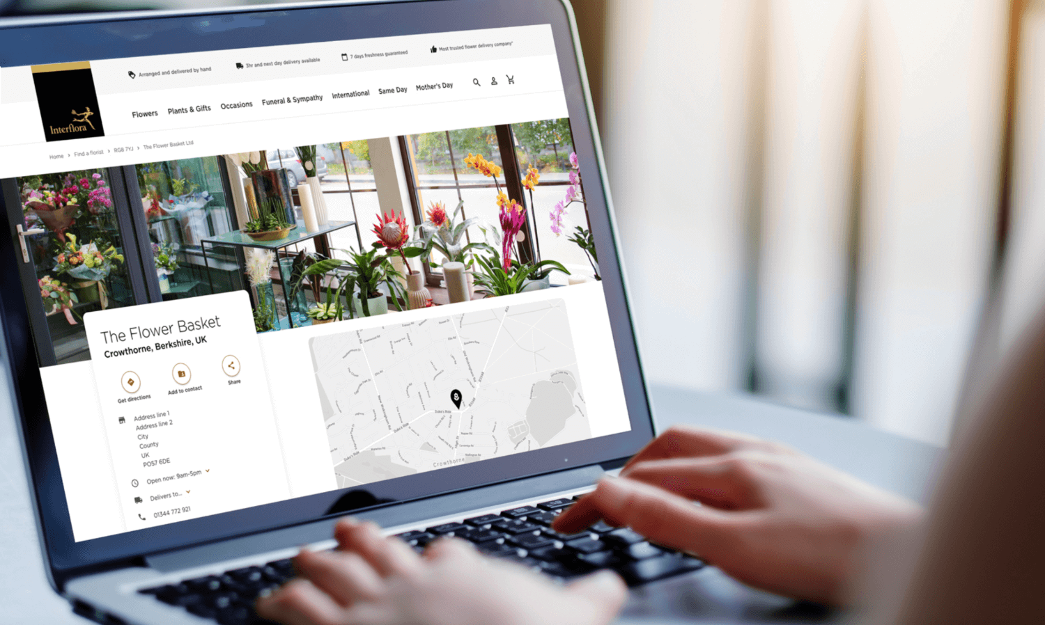 Someone visiting the Interflora website on a laptop